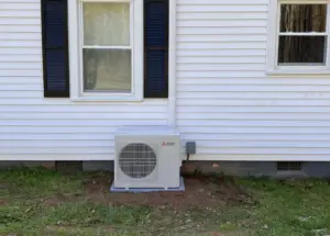 Mitsubishi mini-split heating and cooling unit - HVAC system - outside of residential home